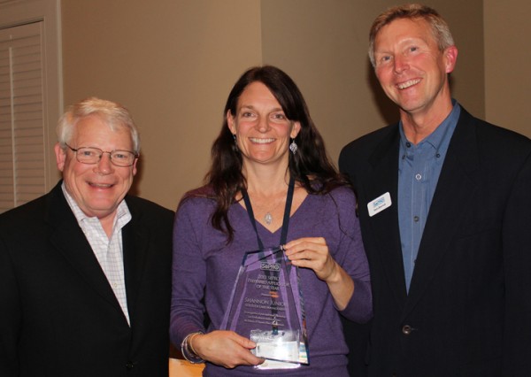   Shannon Junior of SOLitude Lake Management received her Applicator of the Year award from Bill Culpepper (left), President and CEO of SePRO Corporation and Sam Barrick, Executive Director of SePRO's Aquatics Business Unit, at the Preferred Applicator Seminar in Whitakers, North Carolina.  